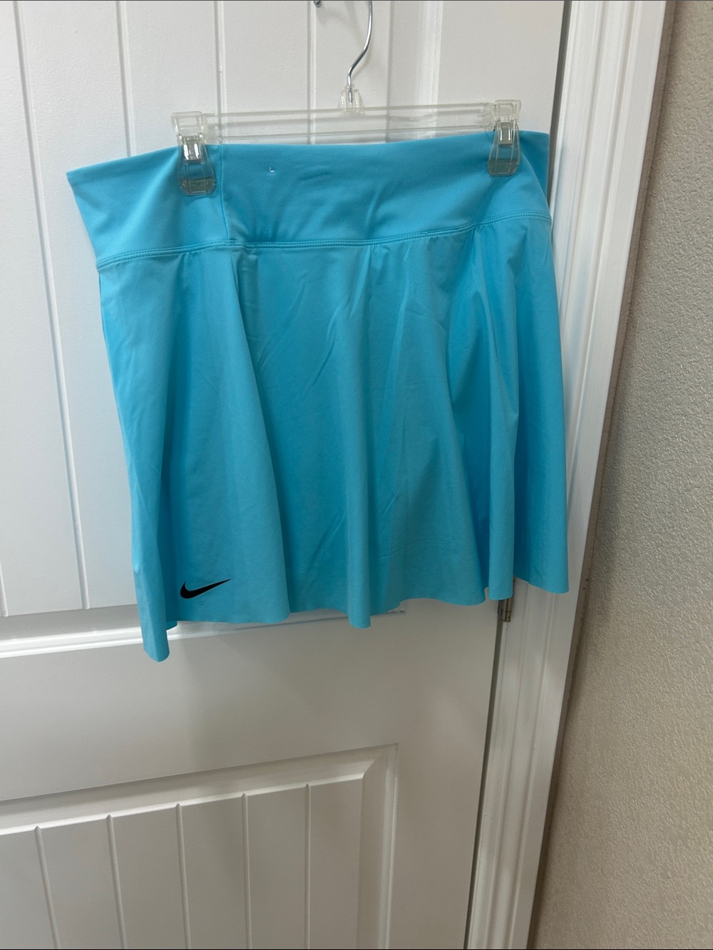 Nike Women's Bright Turquoise tennis Skortwith Black Swoosh